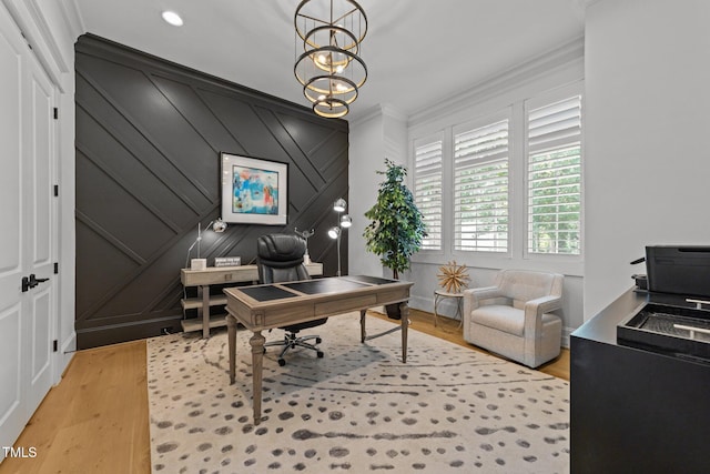 1208 Hunting Ridge Rd, Raleigh, NC 27615 - office area with a decorative wall, crown molding, light wood-style flooring, and a chandelier