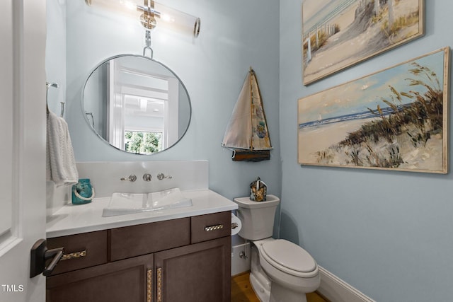 1208 Hunting Ridge Rd, Raleigh, NC 27615 - bathroom featuring vanity and toilet