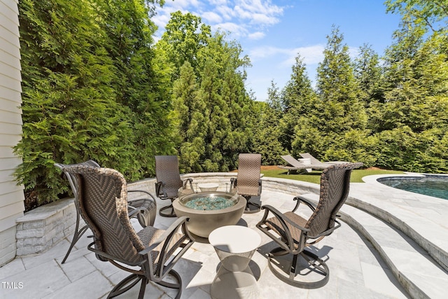 1208 Hunting Ridge Rd, Raleigh, NC 27615 - view of patio / terrace featuring an outdoor fire pit and an outdoor pool