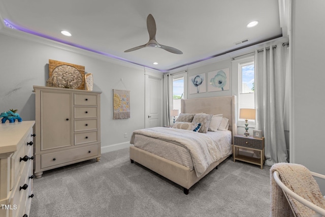 1208 Hunting Ridge Rd, Raleigh, NC 27615 - bedroom with light colored carpet, crown molding, recessed lighting, a ceiling fan, and baseboards