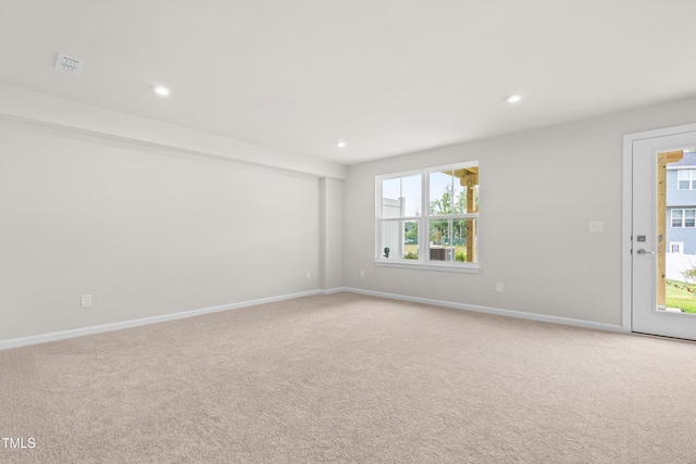 605 Silverado Sunset Loop, Wendell, NC 27591 - spare room with light carpet, recessed lighting, and baseboards