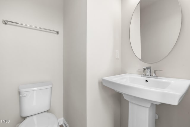 605 Silverado Sunset Loop, Wendell, NC 27591 - bathroom with toilet and a sink