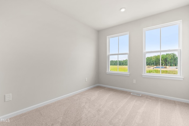 605 Silverado Sunset Loop, Wendell, NC 27591 - spare room with baseboards, carpet, and recessed lighting