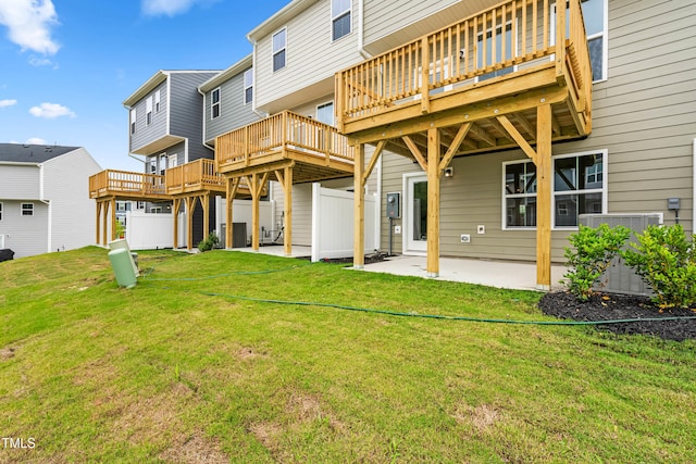 605 Silverado Sunset Loop, Wendell, NC 27591 - rear view of house with a patio area, a lawn, a deck, and a residential view