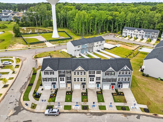 605 Silverado Sunset Loop, Wendell, NC 27591 - drone / aerial view of a nearby body of water and a heavily wooded area