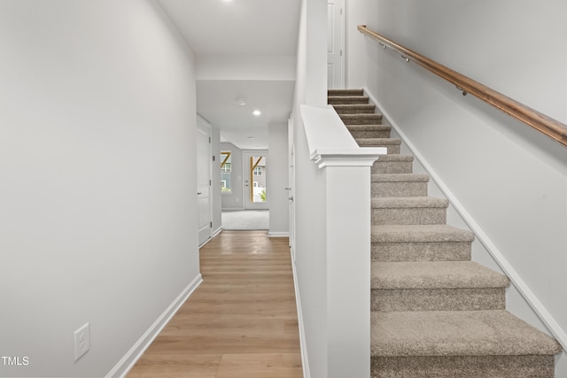 609 Silverado Sunset Loop, Wendell, NC 27591 - staircase with wood finished floors, recessed lighting, and baseboards