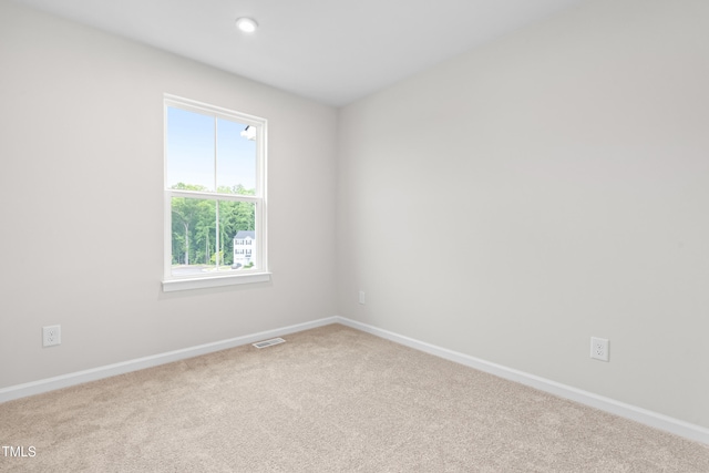 609 Silverado Sunset Loop, Wendell, NC 27591 - empty room featuring baseboards and carpet floors