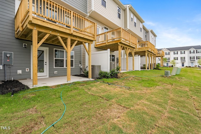 609 Silverado Sunset Loop, Wendell, NC 27591 - back of property featuring a patio, cooling unit, a wooden deck, and a residential view