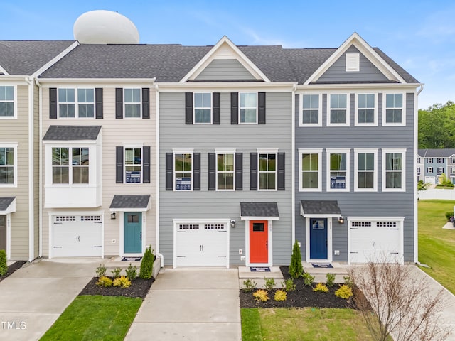 609 Silverado Sunset Loop, Wendell, NC 27591 - townhome / multi-family property featuring driveway and roof with shingles