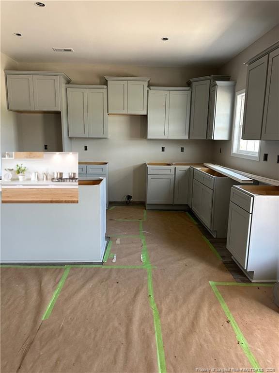 254 Dalton Dr, Lumber Bridge, NC 28357 - kitchen with gray cabinets