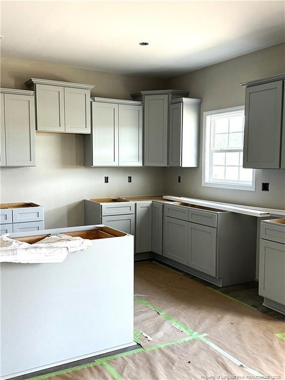 254 Dalton Dr, Lumber Bridge, NC 28357 - kitchen featuring gray cabinets