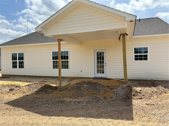 254 Dalton Dr, Lumber Bridge, NC 28357 - rear view of property with a shingled roof