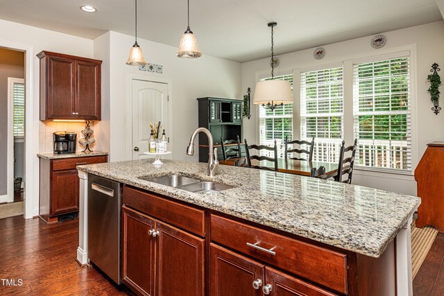 2739 Elderberry Ln, Apex, NC 27539 - kitchen featuring dishwasher, a sink, dark wood-type flooring, light stone counters, and recessed lighting