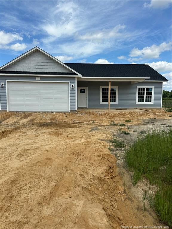 236 Dalton Dr, Lumber Bridge, NC 28357 - ranch-style home with a garage
