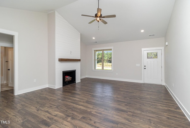 unfurnished living room featuring visible vents, baseboards, ceiling fan, dark wood finished floors, and a fireplace