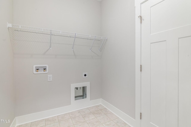 washroom featuring light tile patterned floors, baseboards, laundry area, electric dryer hookup, and hookup for a washing machine