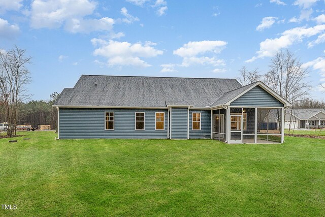 613 Tuscany Cir, Princeton, NC 27569 - rear view of house with a sunroom and a lawn