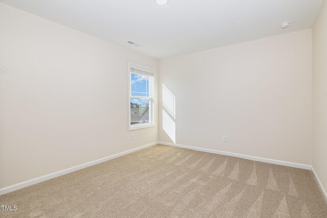 300 Tuscany Cir, Princeton, NC 27569 - spare room with visible vents, baseboards, and light carpet