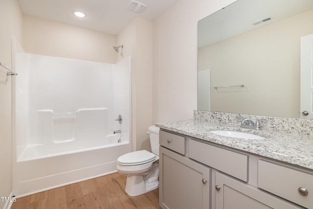 300 Tuscany Cir, Princeton, NC 27569 - full bath with vanity, visible vents, toilet, and wood finished floors