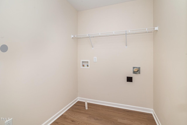 300 Tuscany Cir, Princeton, NC 27569 - washroom with laundry area, electric dryer hookup, wood finished floors, washer hookup, and baseboards