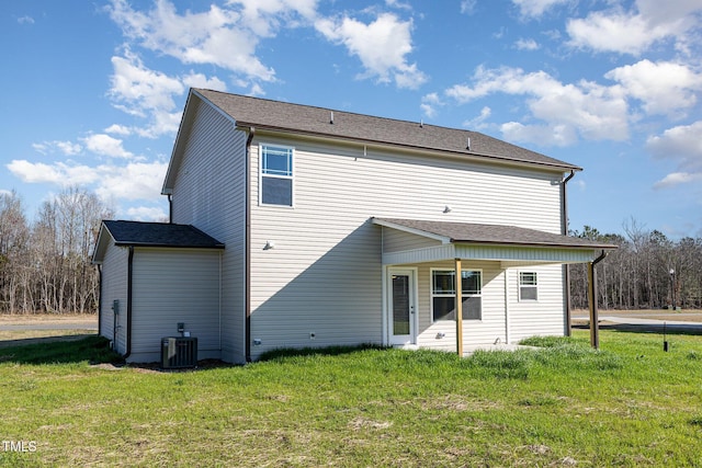 300 Tuscany Cir, Princeton, NC 27569 - back of house with central AC and a lawn