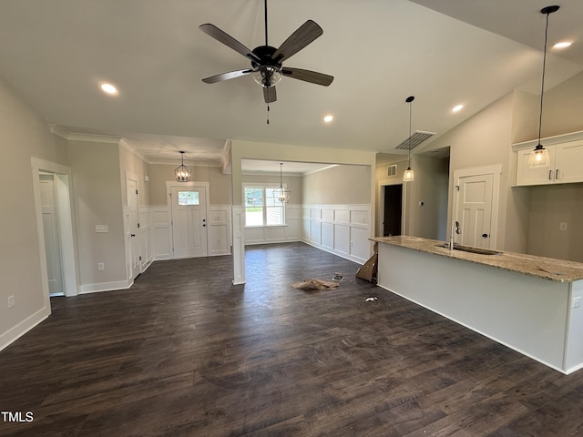 28 Bailey-Boykin Rd, Selma, NC 27576 - unfurnished living room with dark wood-style flooring, ceiling fan, a wainscoted wall, recessed lighting, and a decorative wall