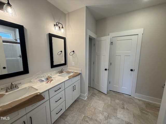 28 Bailey-Boykin Rd, Selma, NC 27576 - full bath featuring double vanity and stone finish floors
