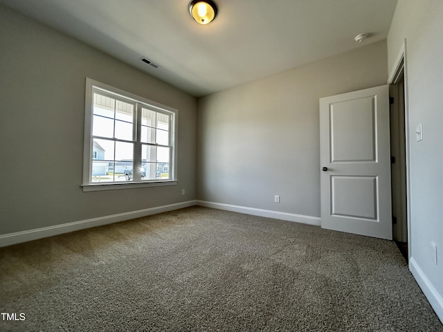 3912 Origin Dr, Bailey, NC 27807 - carpeted empty room with baseboards