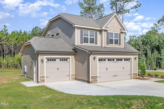 18 Bonnybrook Ct, Selma, NC 27576 - view of front of home featuring driveway, roof with shingles, stone siding, a front lawn, and an attached garage