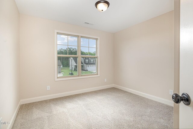 18 Bonnybrook Ct, Selma, NC 27576 - carpeted empty room with baseboards