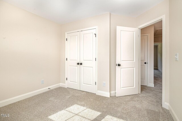 18 Bonnybrook Ct, Selma, NC 27576 - unfurnished bedroom featuring carpet flooring and a closet