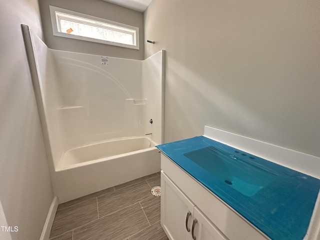 bathroom with vanity and  shower combination