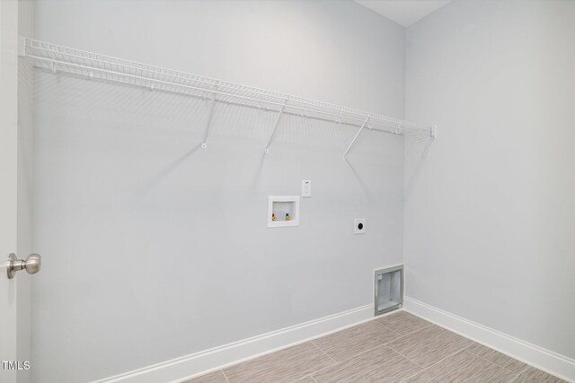 98 Laramie Ln, Selma, NC 27576 - washroom featuring electric dryer hookup and hookup for a washing machine