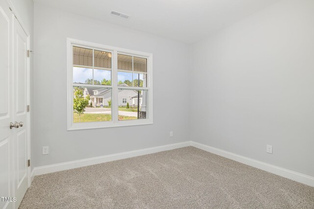 98 Laramie Ln, Selma, NC 27576 - empty room featuring carpet and baseboards