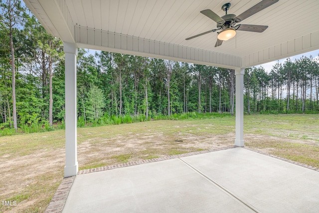 98 Laramie Ln, Selma, NC 27576 - view of patio with ceiling fan and a forest view