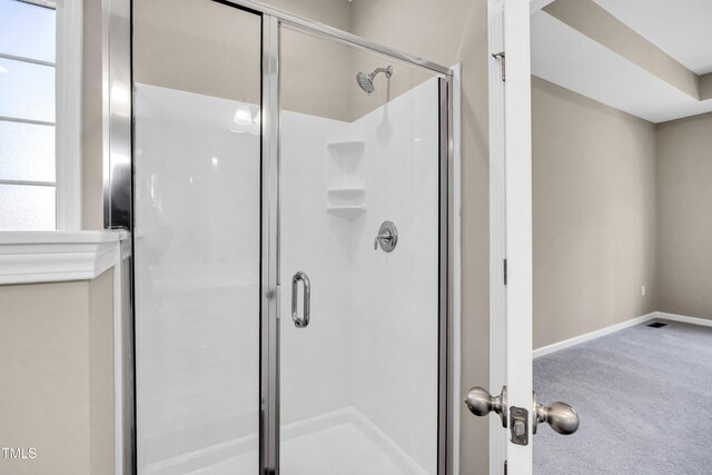 3027 Wesley Farm Ln, Sophia, NC 27350 - full bathroom featuring a shower stall and baseboards