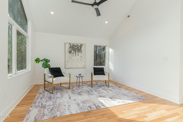 sitting room featuring high vaulted ceiling, baseboards, ceiling fan, wood finished floors, and recessed lighting