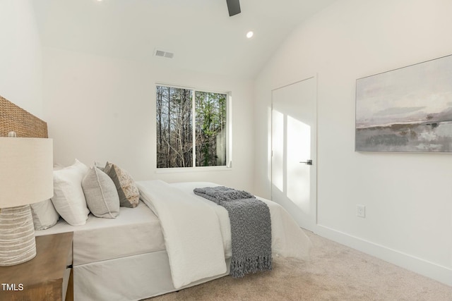 carpeted bedroom featuring visible vents, baseboards, recessed lighting, a ceiling fan, and vaulted ceiling