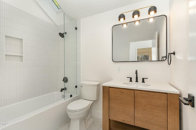 full bath featuring shower / bathing tub combination, vaulted ceiling, toilet, and vanity
