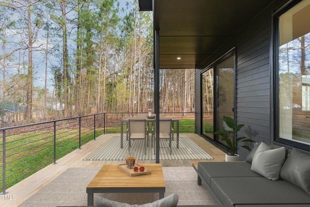 view of patio / terrace featuring an outdoor living space and outdoor dining space
