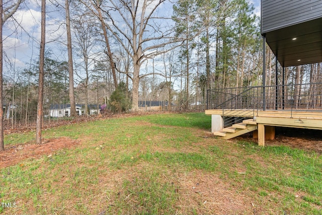 view of yard featuring a deck