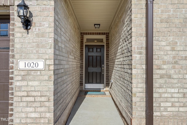 1053 Beechcraft Dr Unit 124, Mebane, NC 27302 - view of exterior entry featuring brick siding