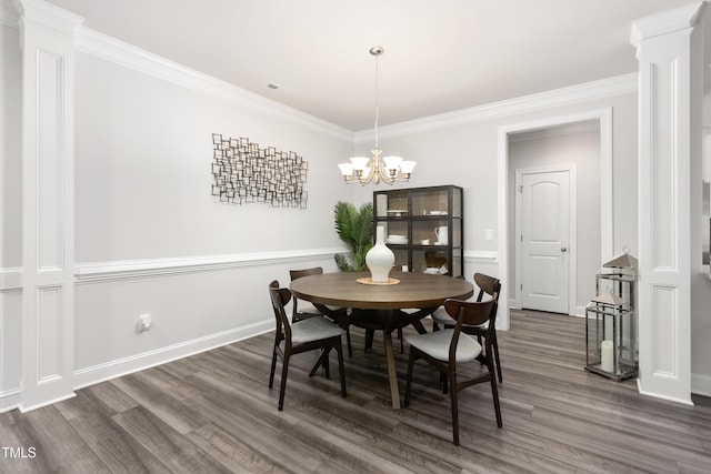 1053 Beechcraft Dr Unit 124, Mebane, NC 27302 - dining area featuring ornate columns, ornamental molding, dark wood-type flooring, baseboards, and a notable chandelier