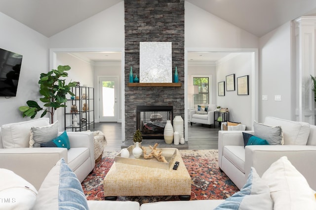 1053 Beechcraft Dr Unit 124, Mebane, NC 27302 - living area with a stone fireplace, a healthy amount of sunlight, and wood finished floors