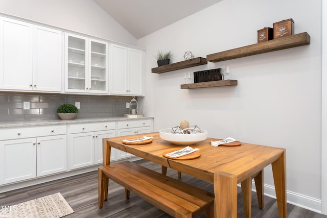 1053 Beechcraft Dr Unit 124, Mebane, NC 27302 - kitchen featuring white cabinetry, vaulted ceiling, open shelves, dark wood-style flooring, and decorative backsplash