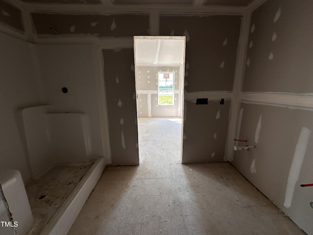 full bath with a shower stall
