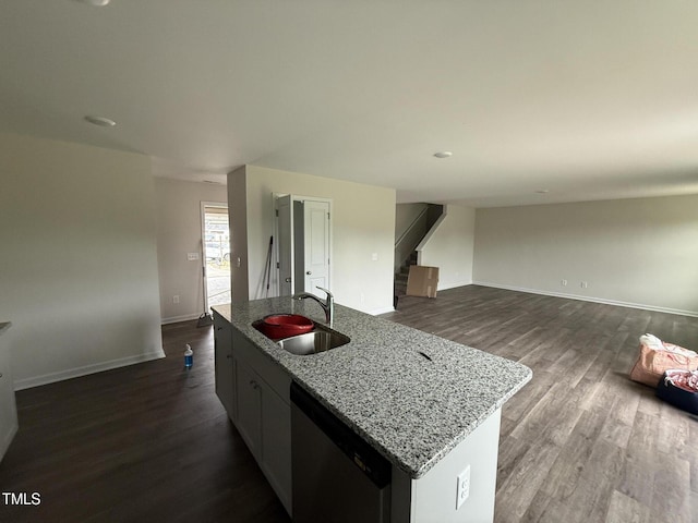 43 Chloe Ct, Selma, NC 27577 - kitchen featuring a sink, stainless steel dishwasher, dark wood-style floors, and an island with sink