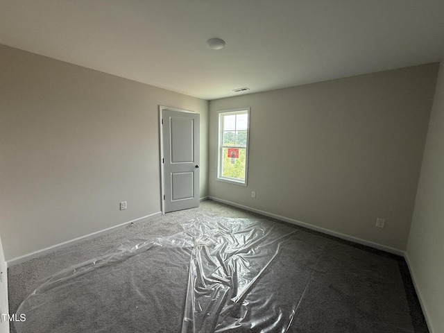 43 Chloe Ct, Selma, NC 27577 - empty room with carpet floors and baseboards