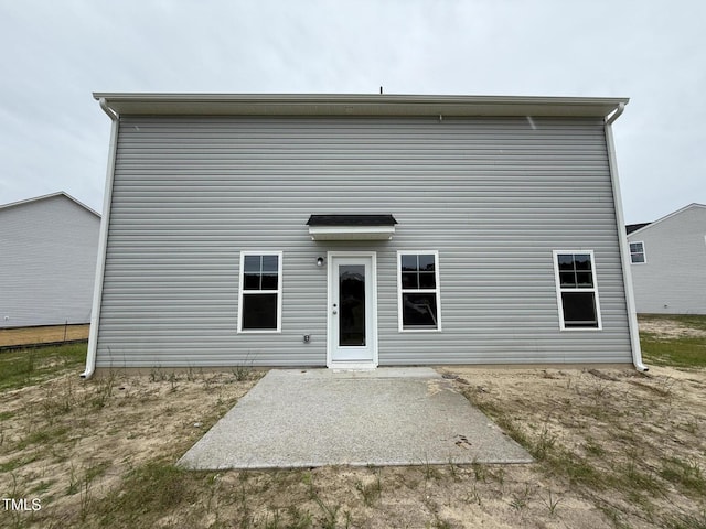 43 Chloe Ct, Selma, NC 27577 - back of property featuring a patio