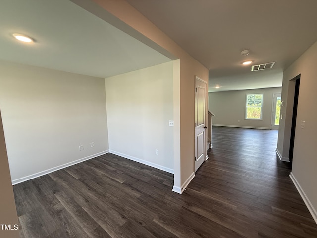 43 Chloe Ct, Selma, NC 27576 - unfurnished room featuring dark wood-style floors and a smoke detector